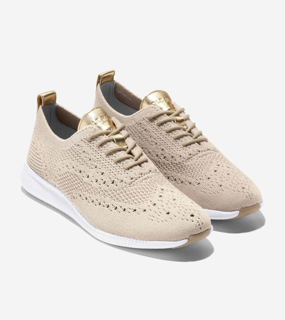 Women's 2.ZERØGRAND Stitchlite™ Wingtip Oxfords in Beige | Cole Haan